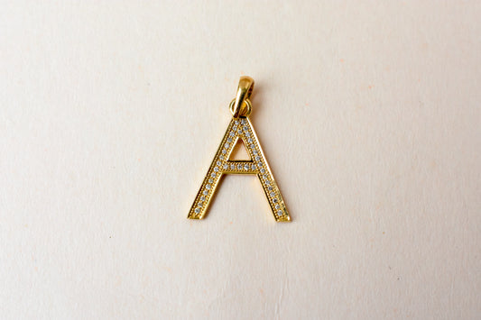 18K gold pendant with diamond pavé letter A