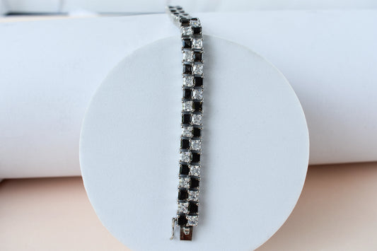 Black and white checkerboard tennis bracelet in silver