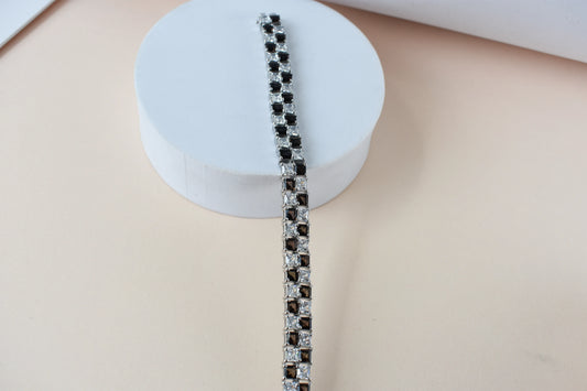 Black and white checkerboard tennis bracelet in silver