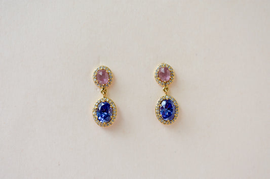 Gold drop earrings with pink and blue sapphire diamond halos