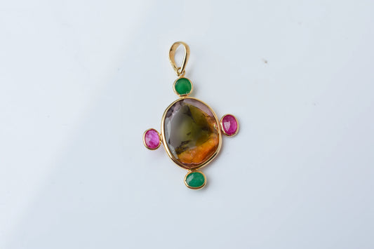18K gold cross pendant with tourmaline, ruby, and emerald