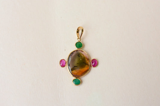 18K gold cross pendant with tourmaline, ruby, and emerald