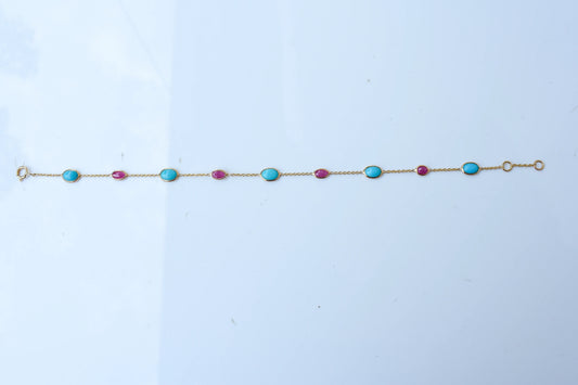 18K gold bracelet with turquoise and ruby stations