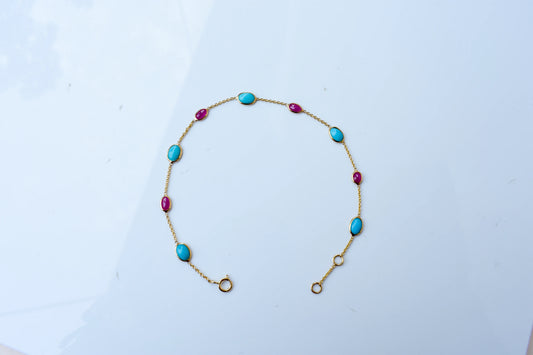 18K gold bracelet with turquoise and ruby stations