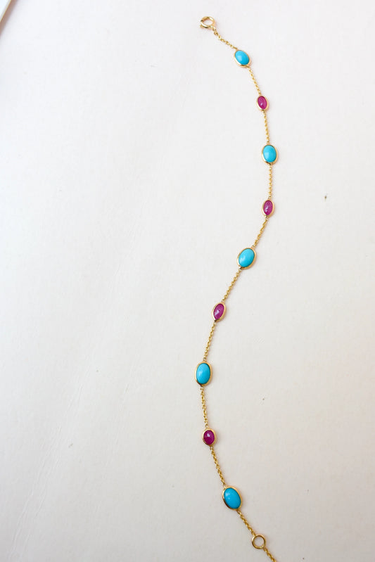 18K gold bracelet with turquoise and ruby stations