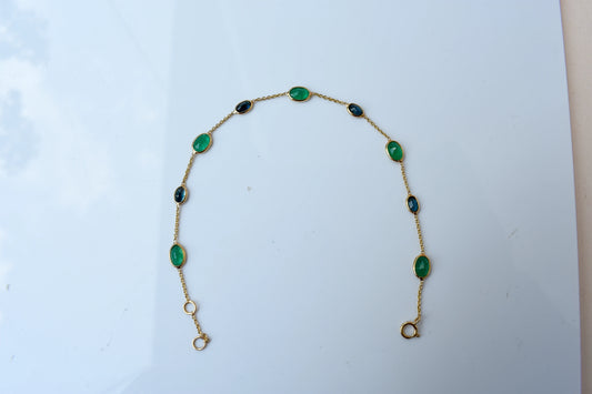 18K gold bracelet with emerald and blue sapphire stations