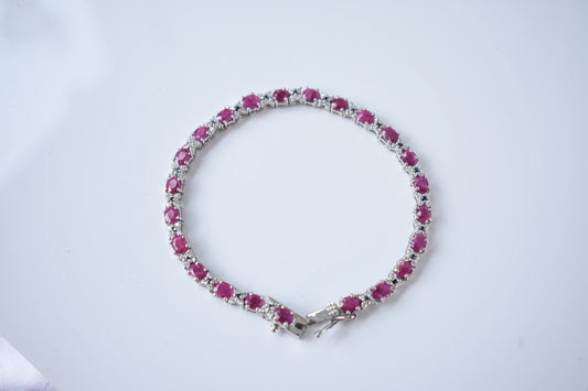 Ruby and cubic zirconia tennis bracelet with round stones set in 925 silver