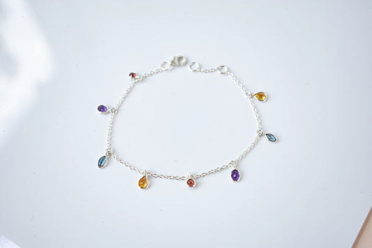 Multi gemstone dangle bracelet with pear-cut colored stones on a 925 silver chain