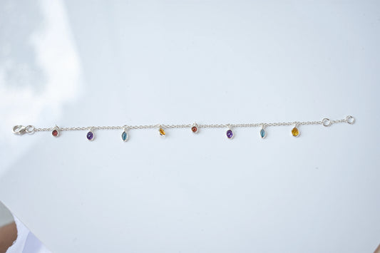 Multi gemstone dangle bracelet with pear-cut colored stones on a 925 silver chain