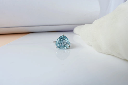 Sky blue topaz trillion-cut solitaire ring in 925 silver