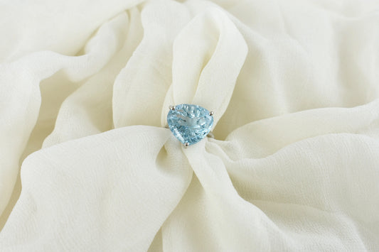 Sky blue topaz trillion-cut solitaire ring in 925 silver