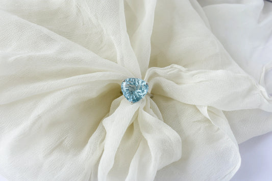 Sky blue topaz trillion-cut solitaire ring in 925 silver