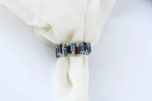 Multi gemstone baguette eternity ring with garnet and Swiss blue topaz in 925 silver
