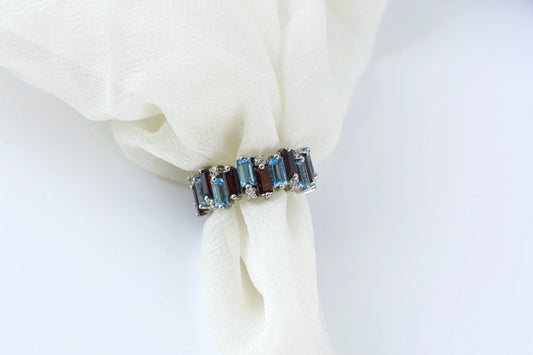 Multi gemstone baguette eternity ring with garnet and Swiss blue topaz in 925 silver