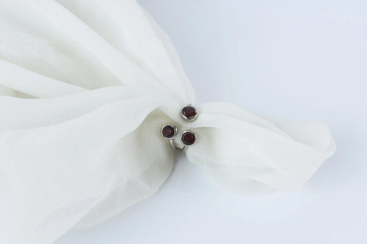 Garnet three-stone open ring in 925 silver