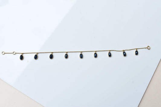 18K gold bracelet with blue sapphire drops in fringe design