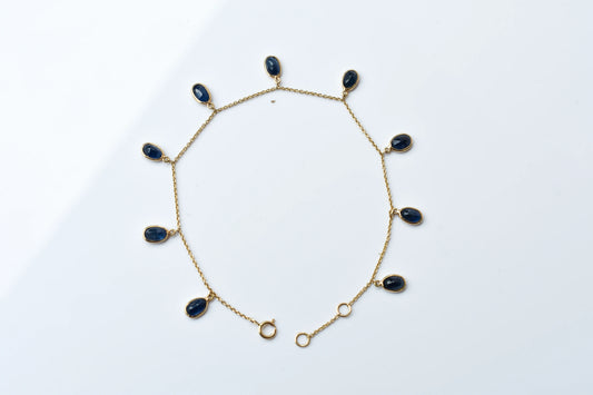18K gold bracelet with blue sapphire drops in fringe design