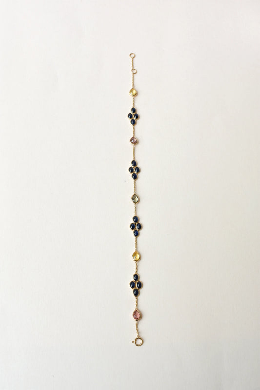 18K gold bracelet with blue sapphire clusters and multi-color sapphire accents