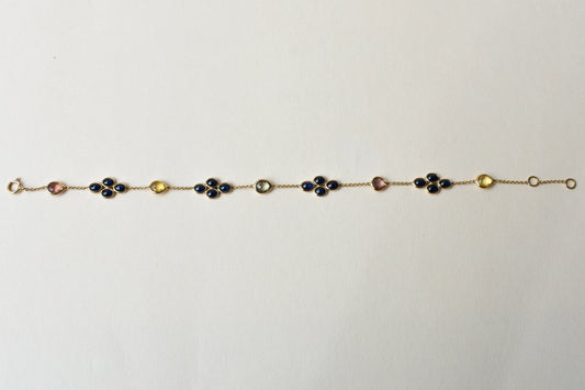 18K gold bracelet with blue sapphire clusters and multi-color sapphire accents