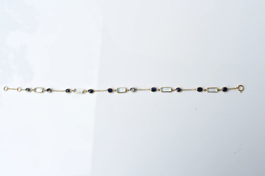 18K gold bracelet with aquamarine and blue sapphire stations
