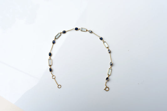 18K gold bracelet with aquamarine and blue sapphire stations