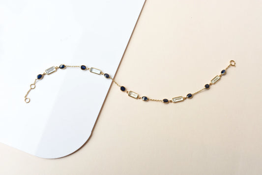 18K gold bracelet with aquamarine and blue sapphire stations