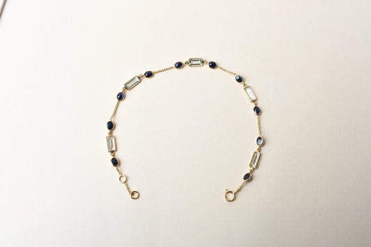 18K gold bracelet with aquamarine and blue sapphire stations