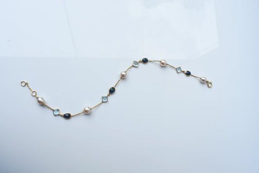 14K gold bracelet with pearls, blue sapphire and aquamarine stations