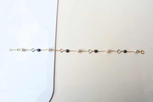 14K gold bracelet with pearls, blue sapphire and aquamarine stations