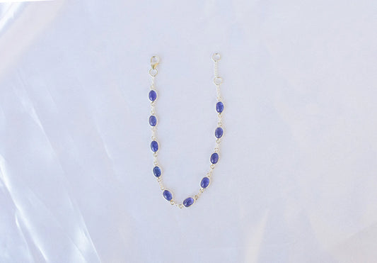 925 silver bracelet with bezel-set oval cabochon tanzanite stones