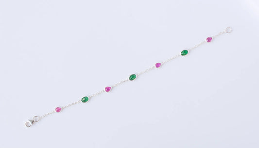 925 silver station bracelet with bezel-set pear-cut rubies and oval-cut emeralds