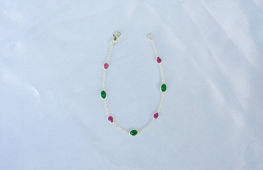 925 silver station bracelet with bezel-set pear-cut rubies and oval-cut emeralds