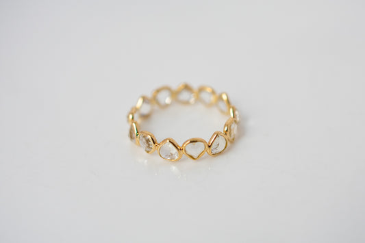 Heart-cut rainbow moonstone gemstone eternity ring in 18K gold with bezel setting