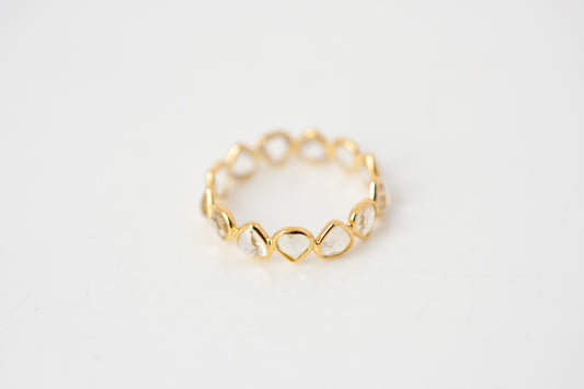 Heart-cut rainbow moonstone gemstone eternity ring in 18K gold with bezel setting