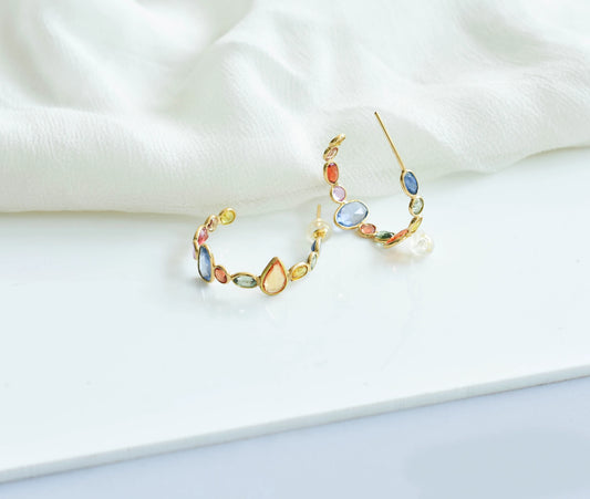 18K gold hoop earrings with graduated multi-color sapphires