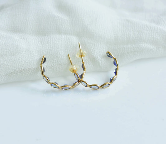 18K gold hoop earrings with graduated pear-cut tanzanite
