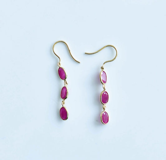 18K gold ruby station drop earrings with graduated oval rubies