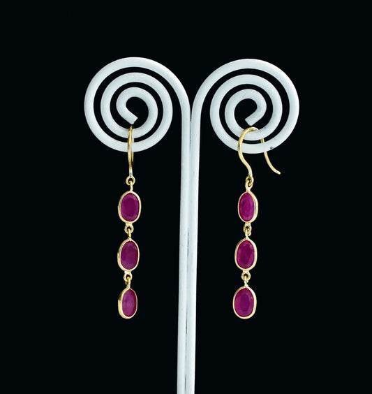 18K gold ruby station drop earrings with graduated oval rubies