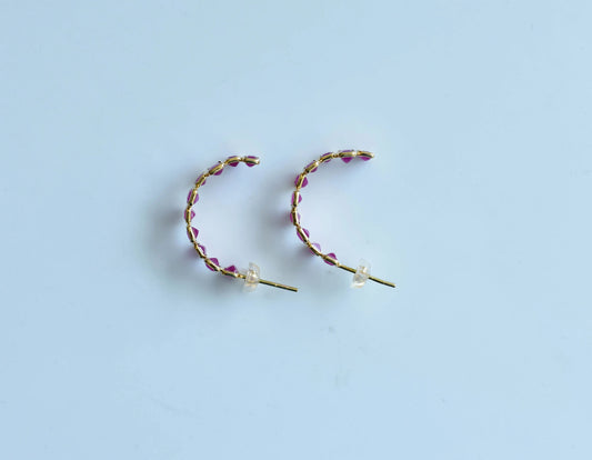 18K gold ear climbers with staggered baguette-cut rubies