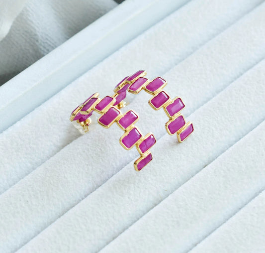 18K gold ear climbers with staggered baguette-cut rubies