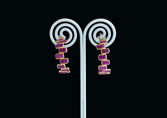 18K gold ear climbers with staggered baguette-cut rubies