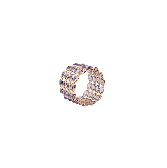 18K gold wide cocktail ring with bezel-set oval tanzanite in a honeycomb pattern