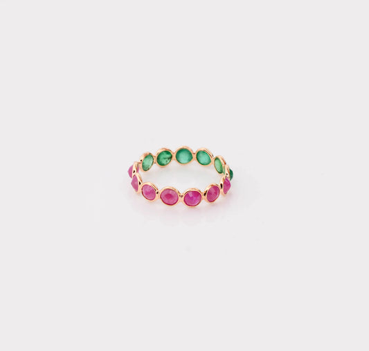 18K gold eternity ring with round-cut emerald and ruby stones in a two-tone design