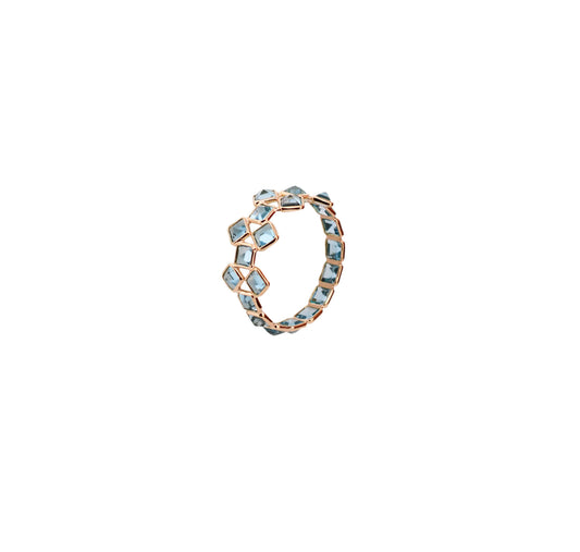 18K gold eternity ring with Swiss blue topaz in a mosaic checkerboard pattern