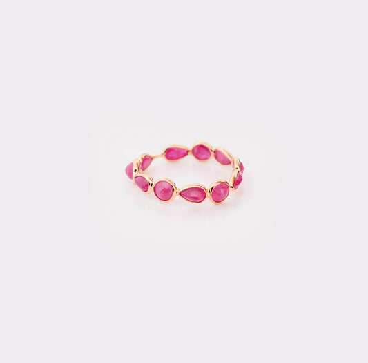 18K gold eternity ring with alternating round and pear-cut rubies