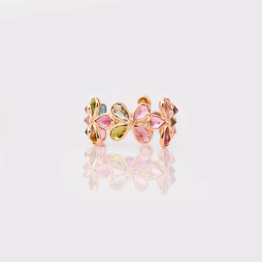 18K gold ring with pear-cut multicolor tourmaline in a floral cluster design