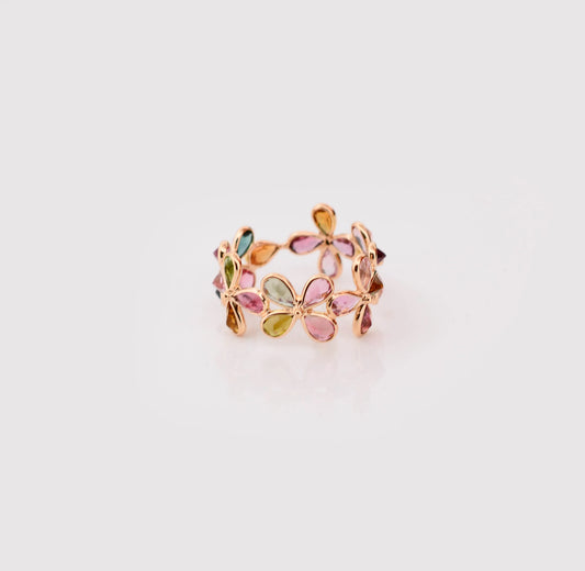 18K gold ring with pear-cut multicolor tourmaline in a floral cluster design