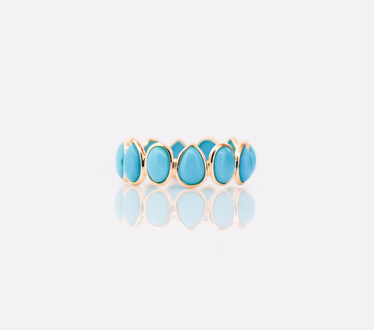 18K gold eternity ring with bezel-set pear and oval turquoise cabochons