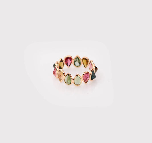 18K gold eternity ring with multicolor pear-cut tourmaline stones