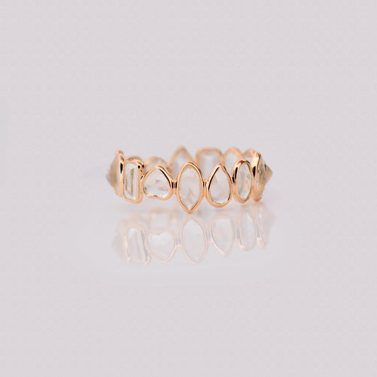 18K gold eternity ring with mixed-cut rainbow moonstone stones